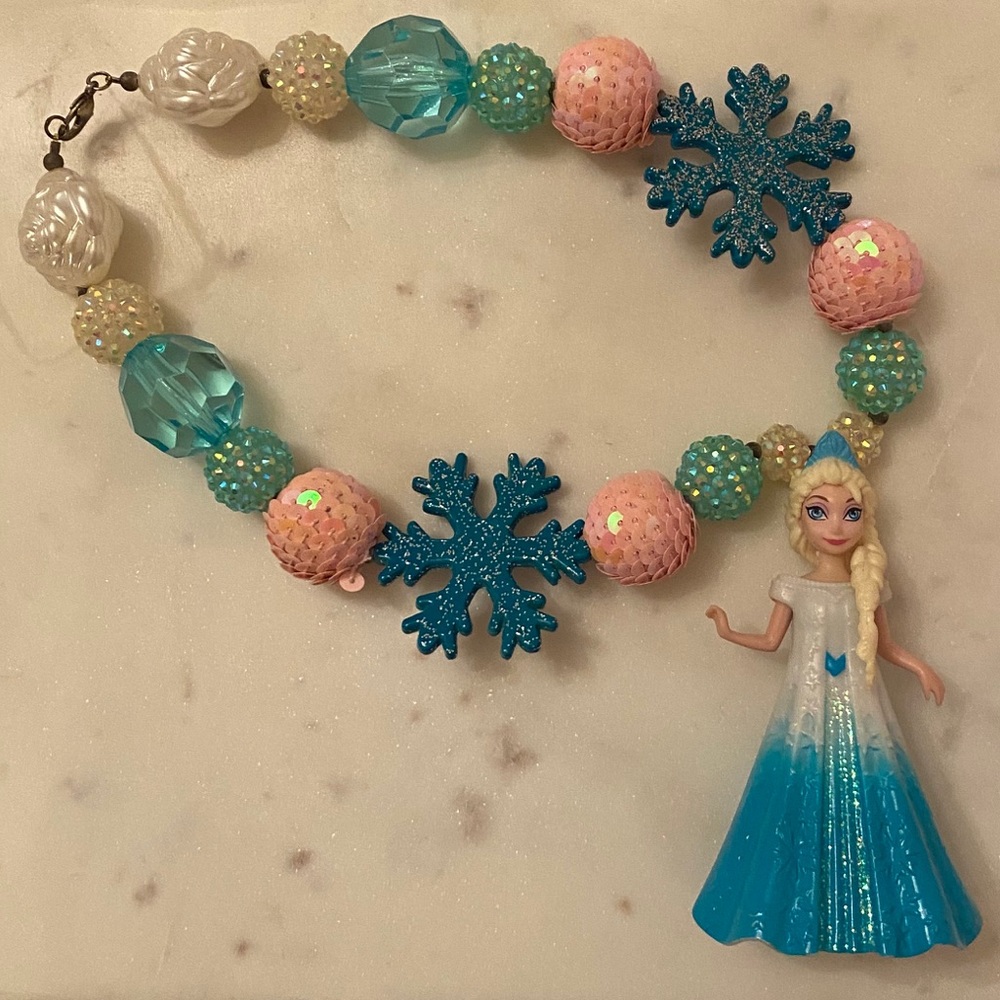 Bubble necklace with Queen Elsa Charm/gently used